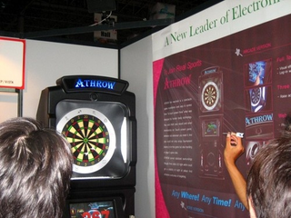 Illustration for article titled Booth Check: Q-Games, Nyko, Acquire, Jun-Tech Zodiac Darts